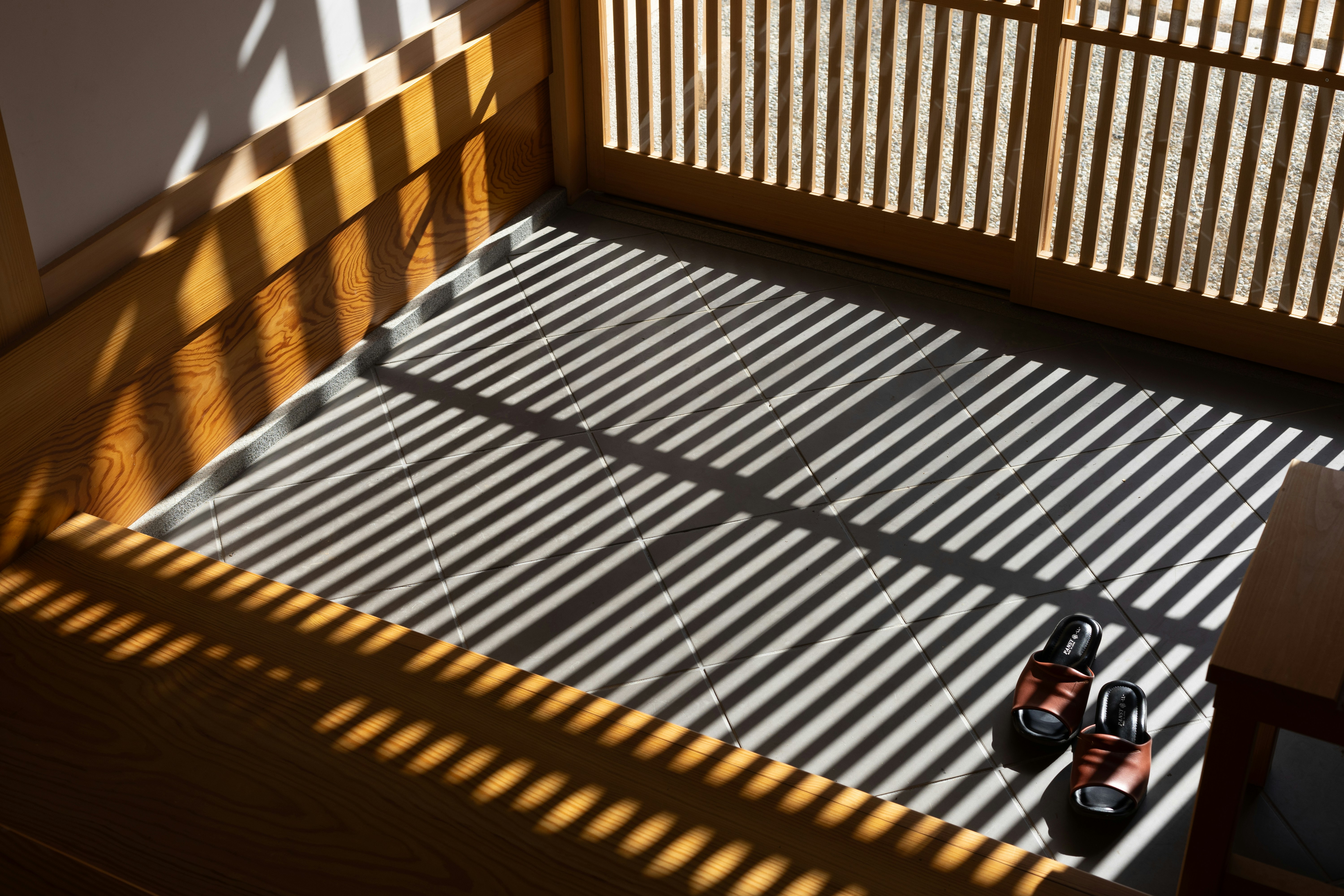 A room with a wooden floor and a window