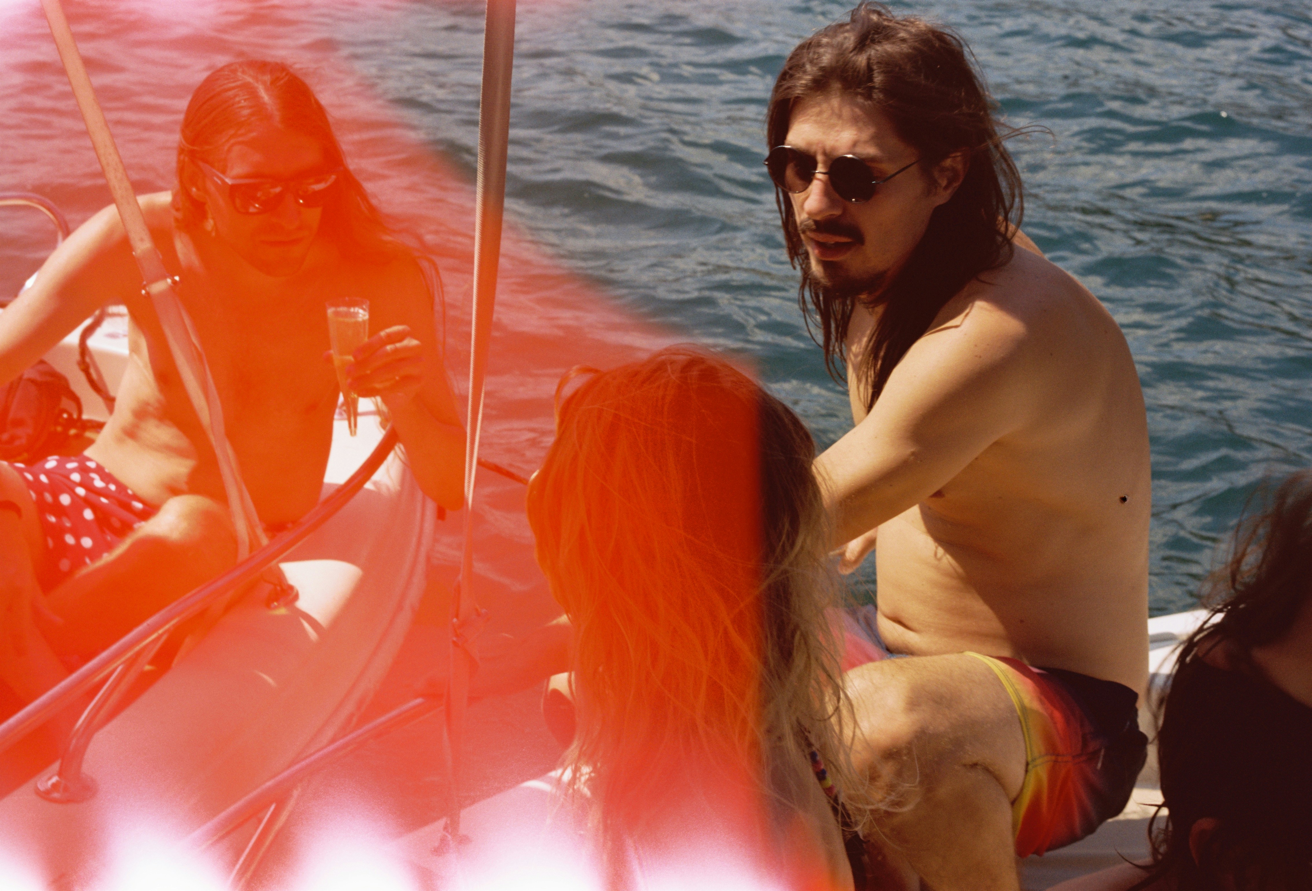 A group of people on a boat in the water photo – Free Lugano Image on ...