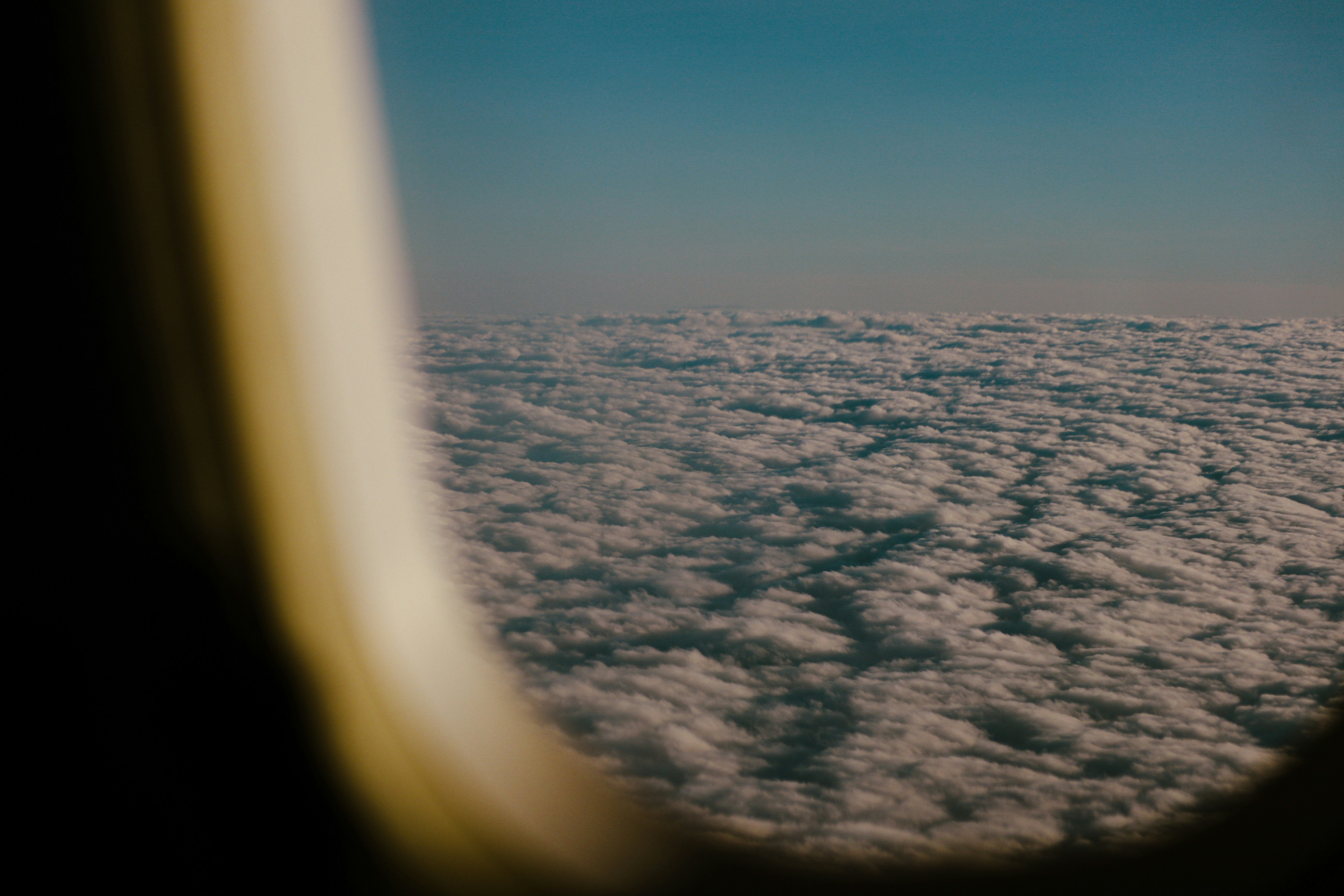 A view of the clouds from an airplane window
