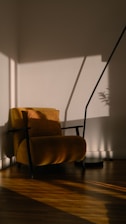 A chair sitting on a hard wood floor in a room