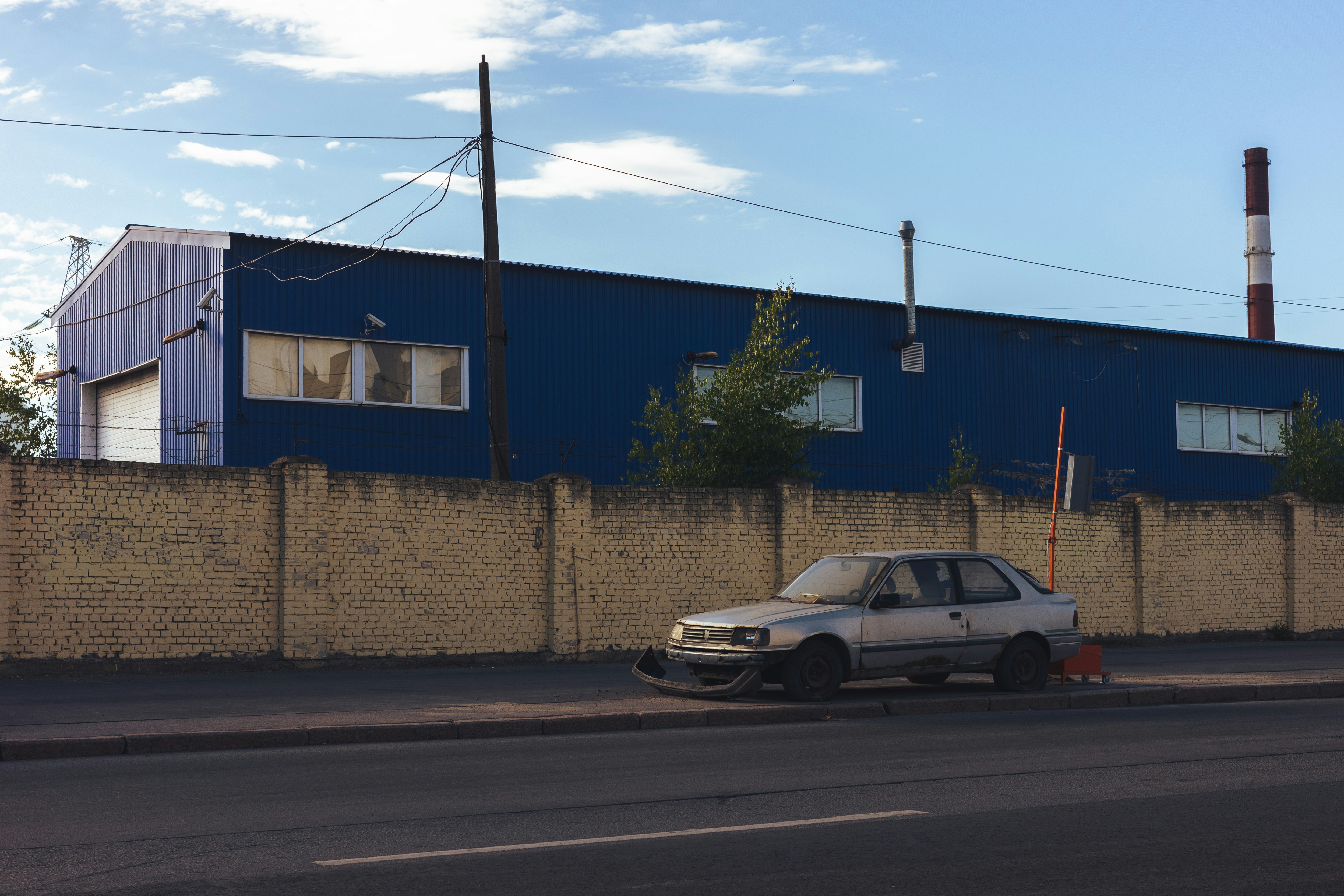 A car is parked on the side of the road