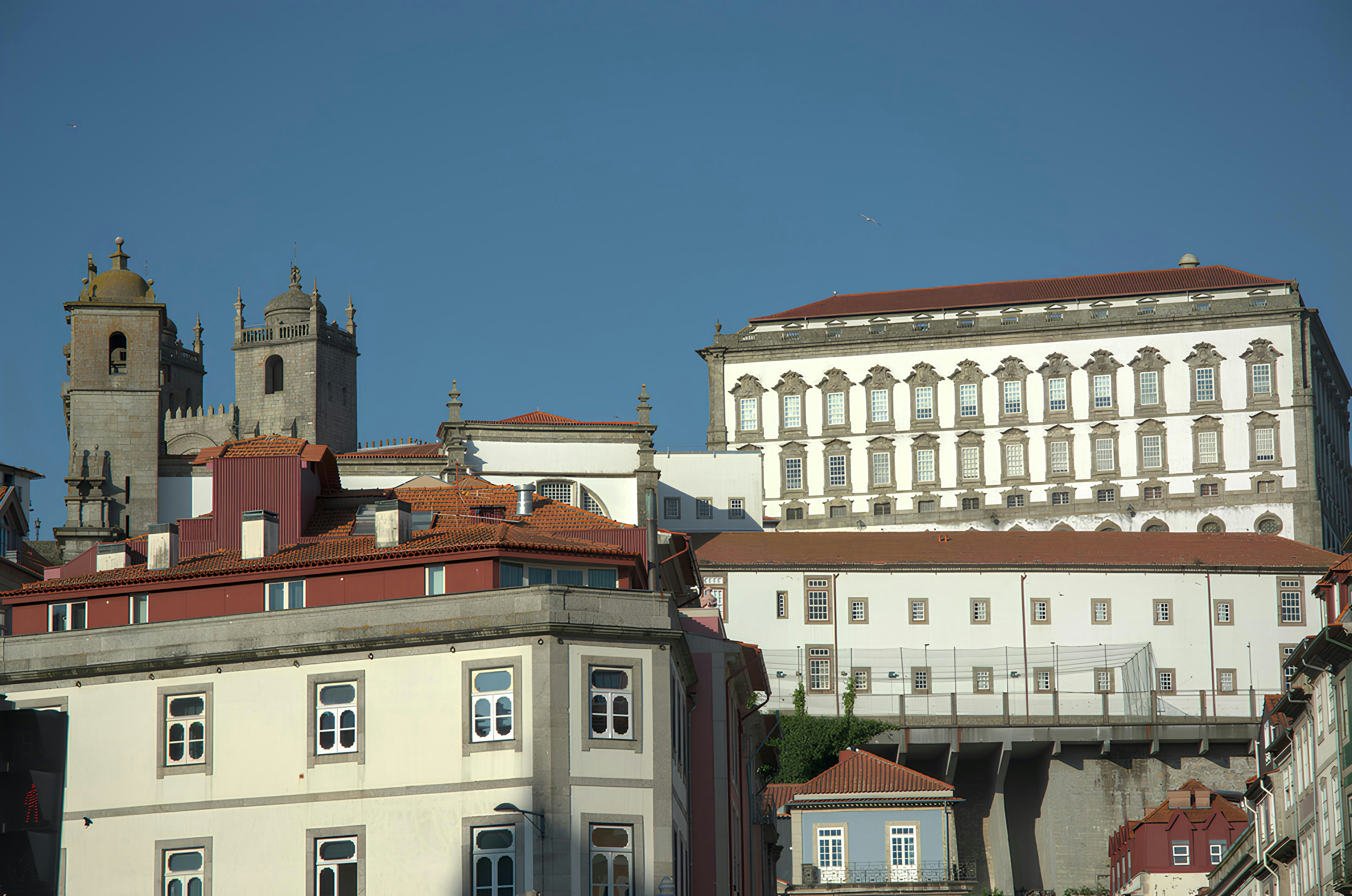 A view of some buildings and a clock tower