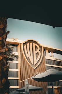 A picture of a building with a logo on it