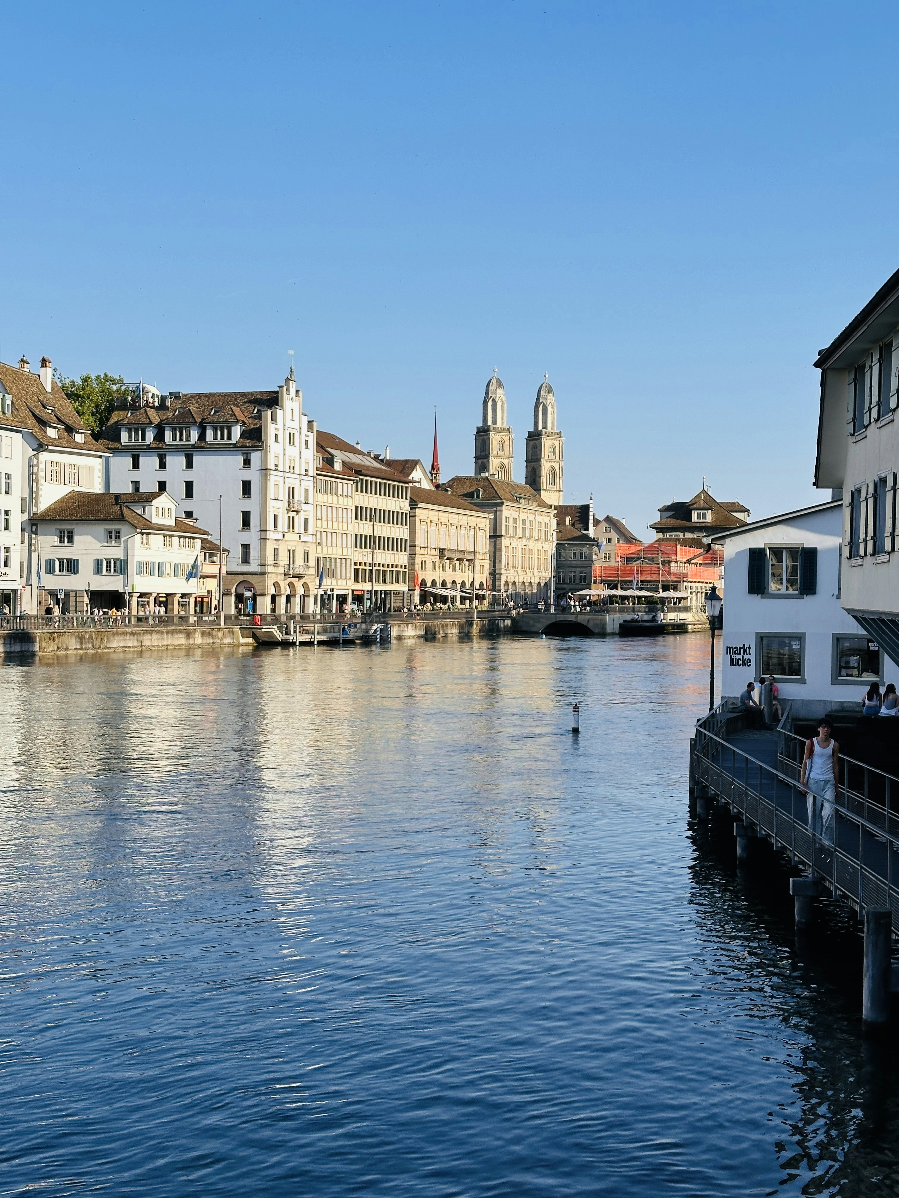 A body of water with buildings on both sides of it