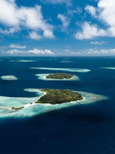 A group of small islands in the middle of the ocean