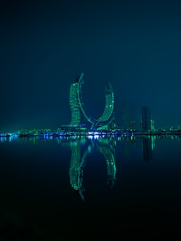 A large body of water with a city in the background