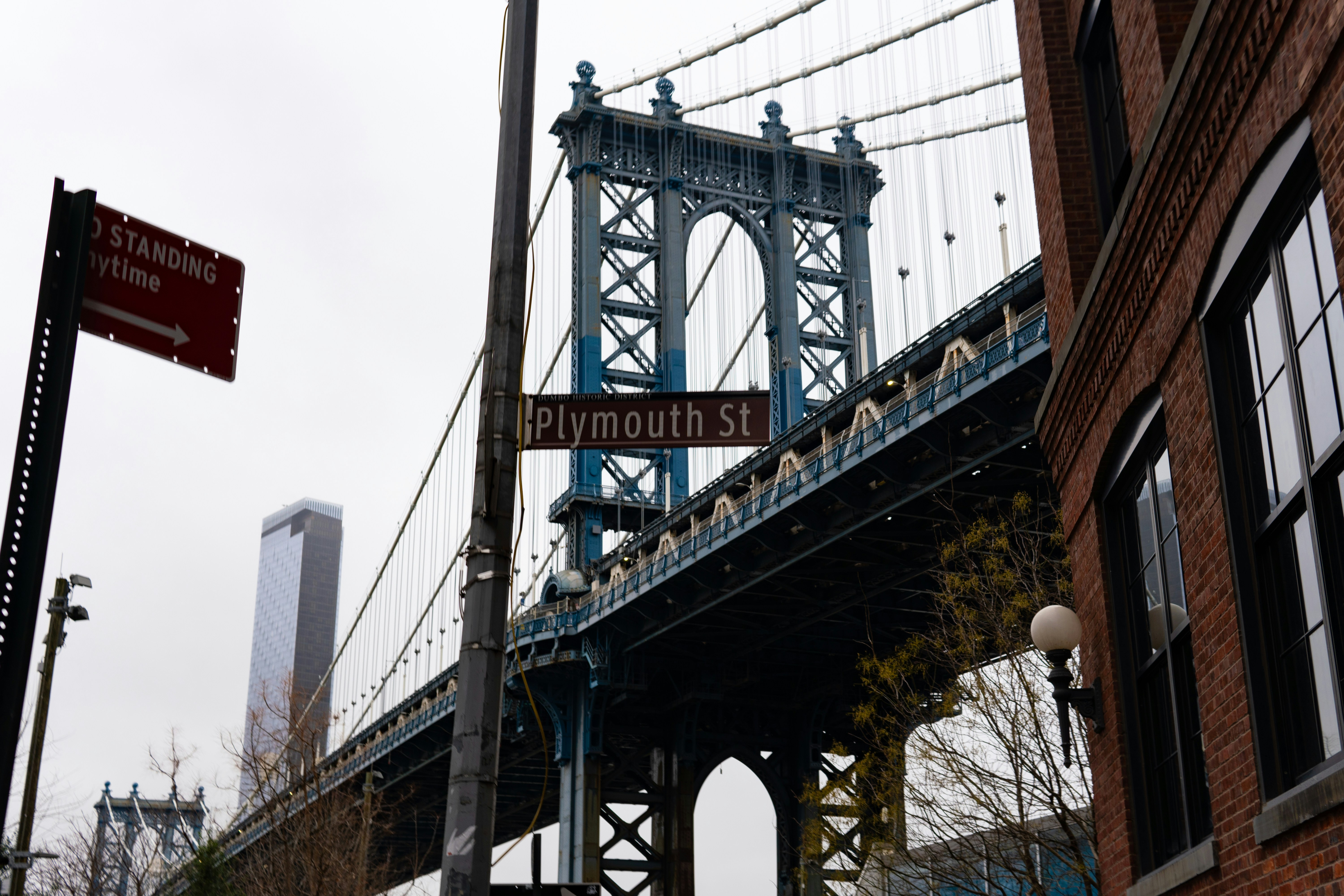 A view of the brooklyn bridge from across the street