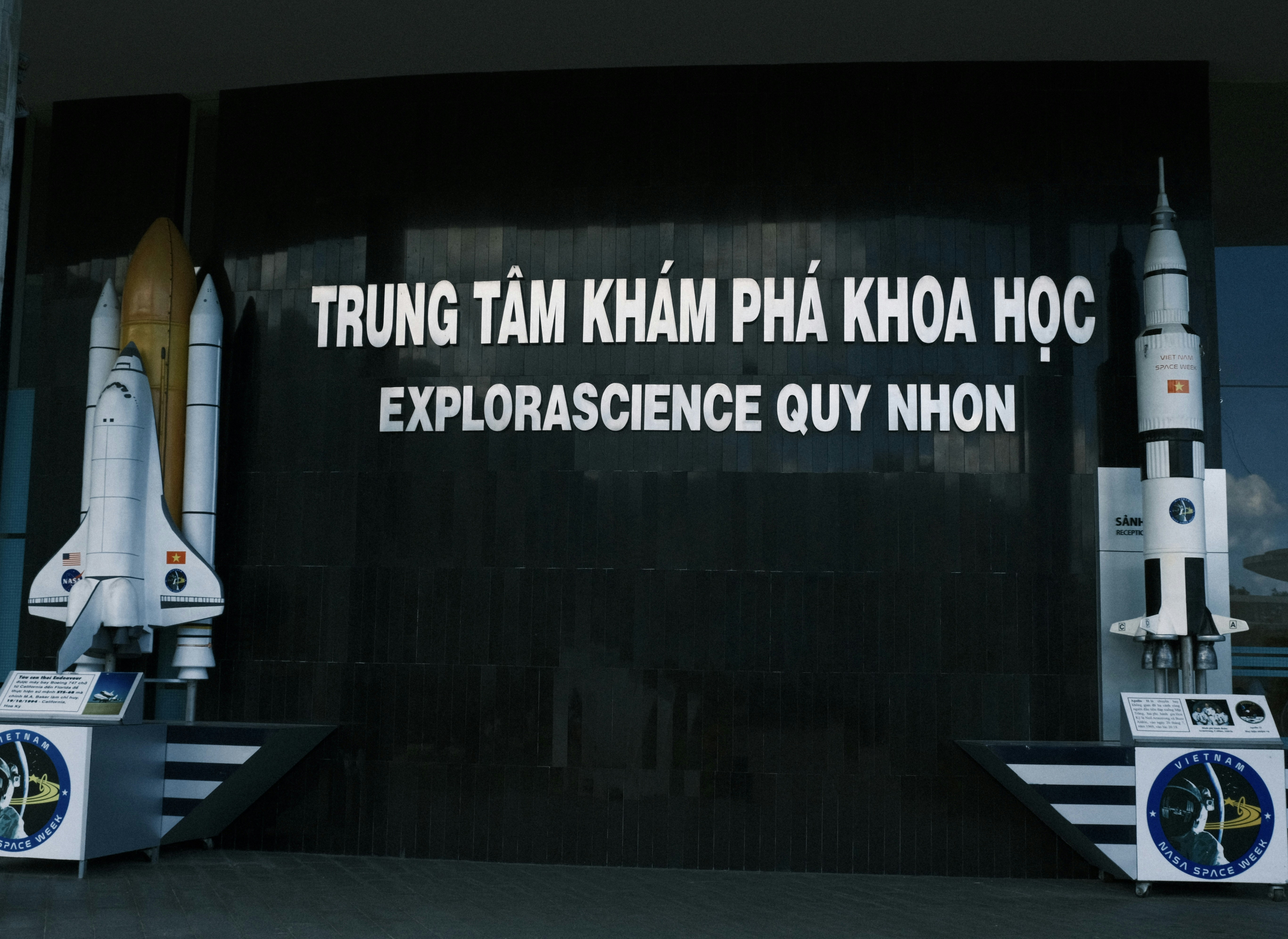 A sign that says "trying tam tam pha kha kha hoc"