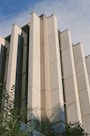 A tall building with a clock on the side of it