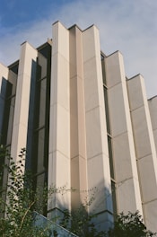 A tall building with a clock on the side of it