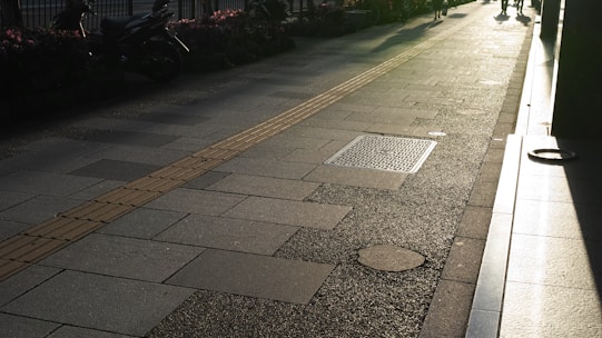 A person riding a skateboard on a city street