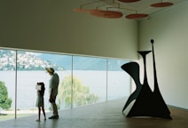 A couple of people that are standing in a room