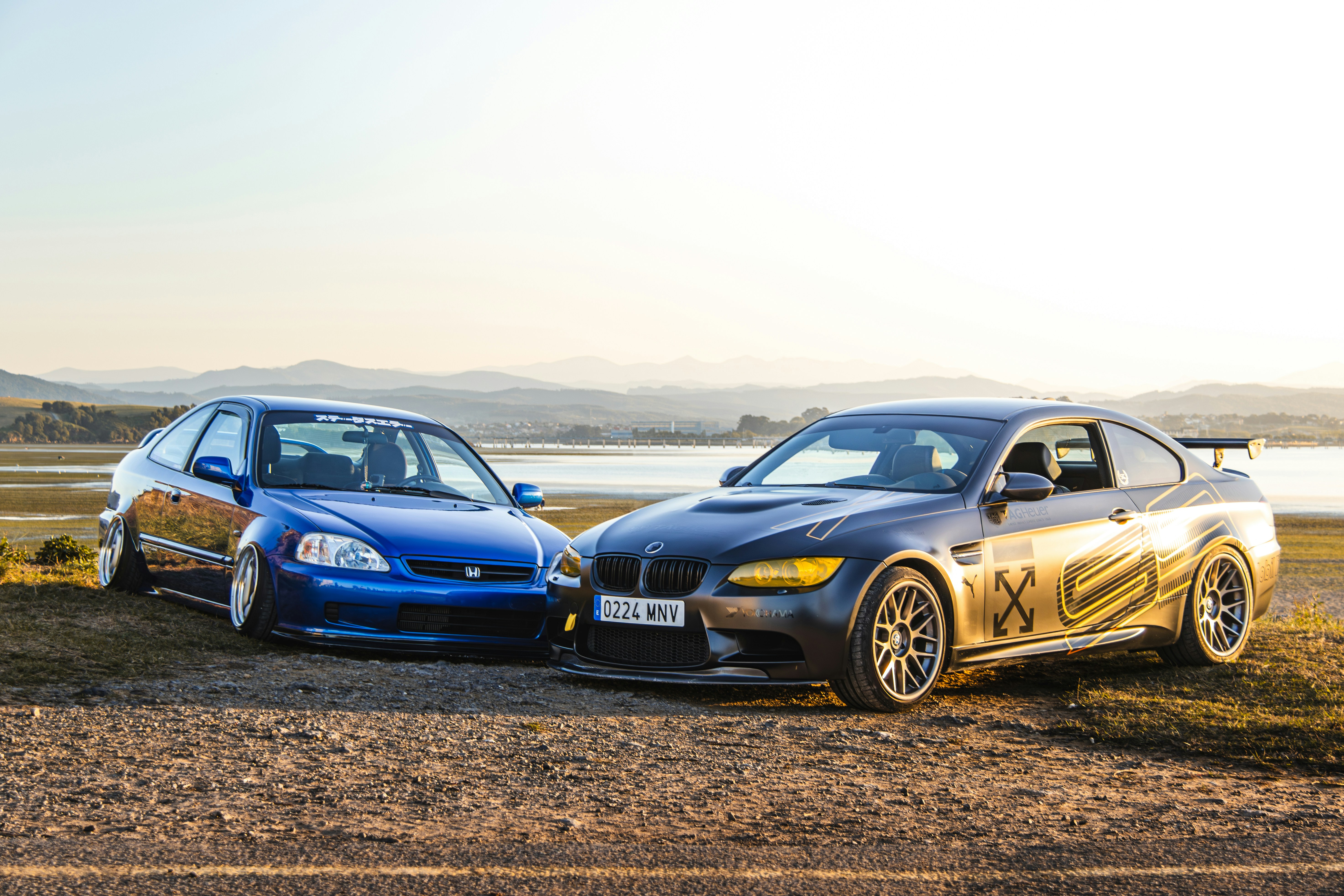 A couple of cars parked next to each other