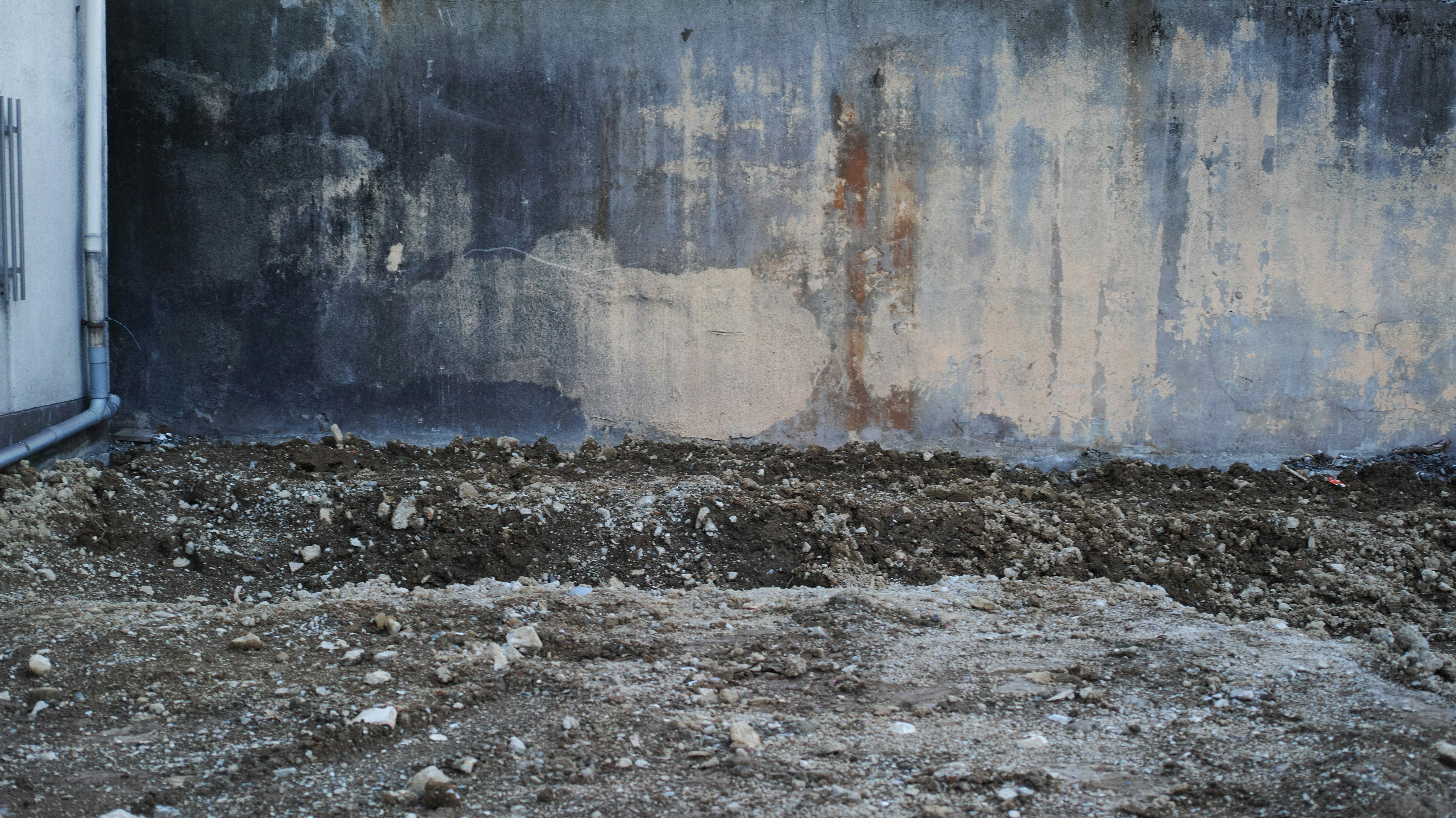 A fire hydrant sitting in front of a building