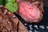 A close up of a piece of meat on a plate