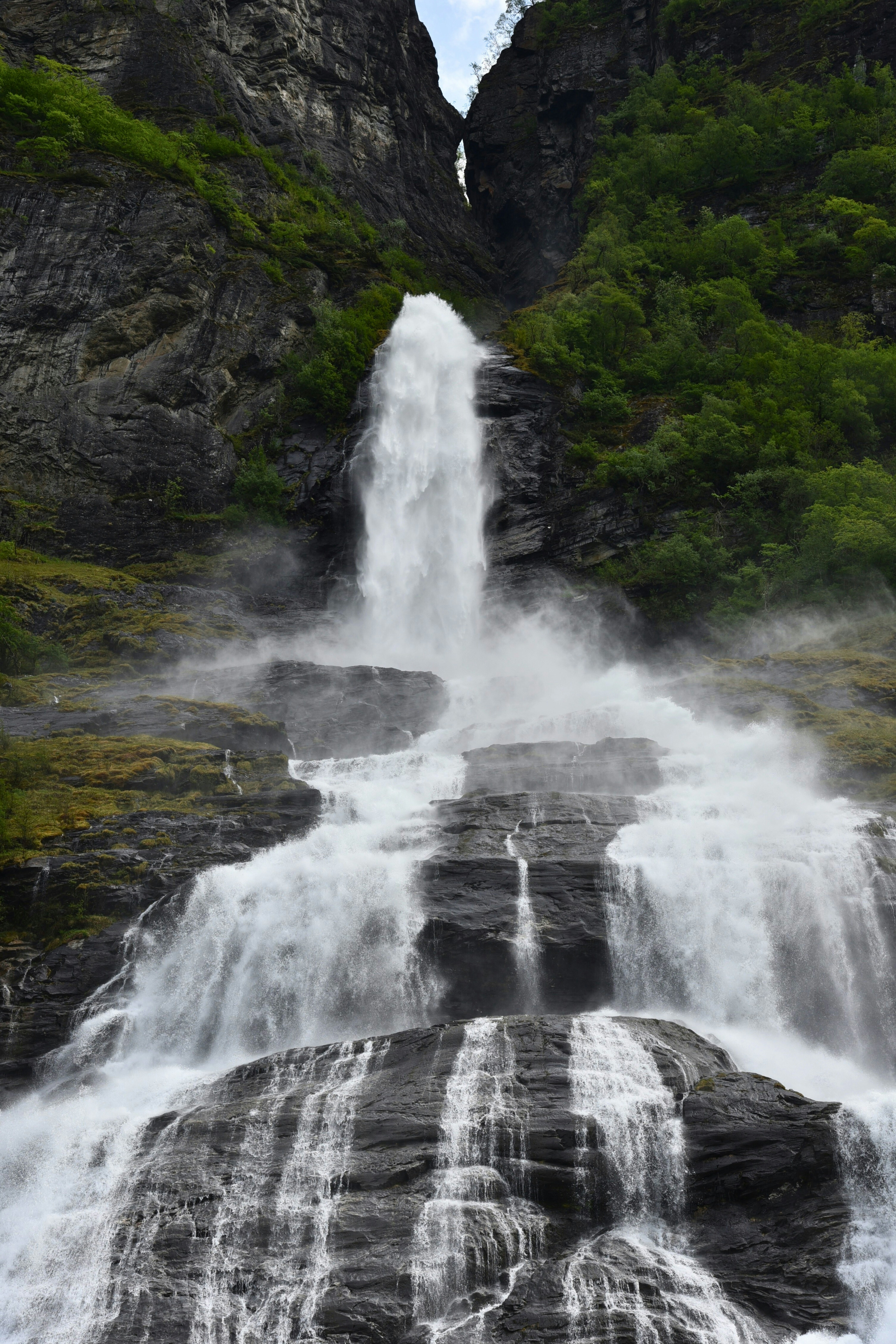 A waterfall with a large amount of water coming out of it