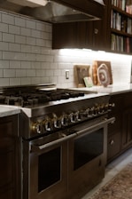 A stove top oven sitting inside of a kitchen