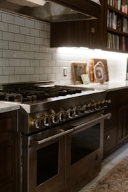 A stove top oven sitting inside of a kitchen