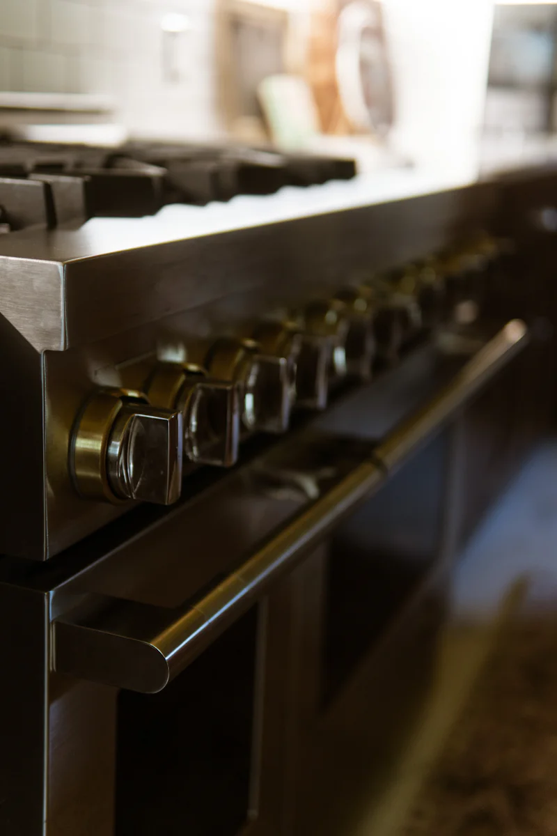 A close up of a stove top oven in a kitchen