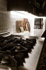 A stove top oven sitting inside of a kitchen