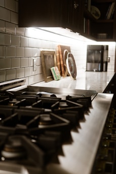 A stove top oven sitting inside of a kitchen
