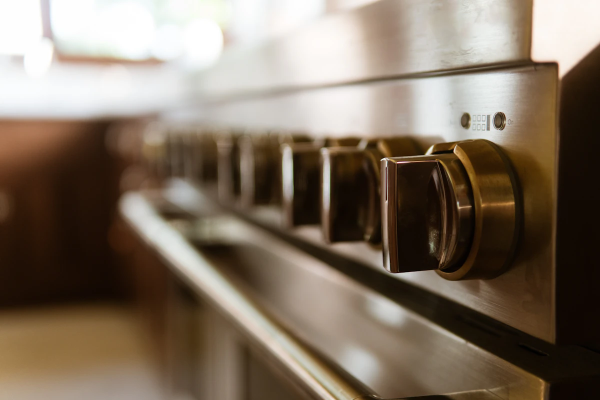 A close up of a stove top oven in a kitchen