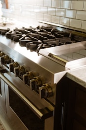 A stainless steel stove top oven in a kitchen