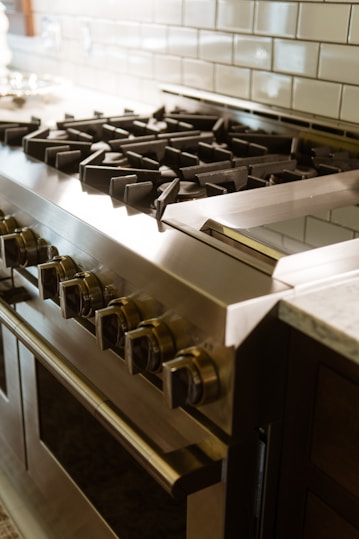A stainless steel stove top oven in a kitchen