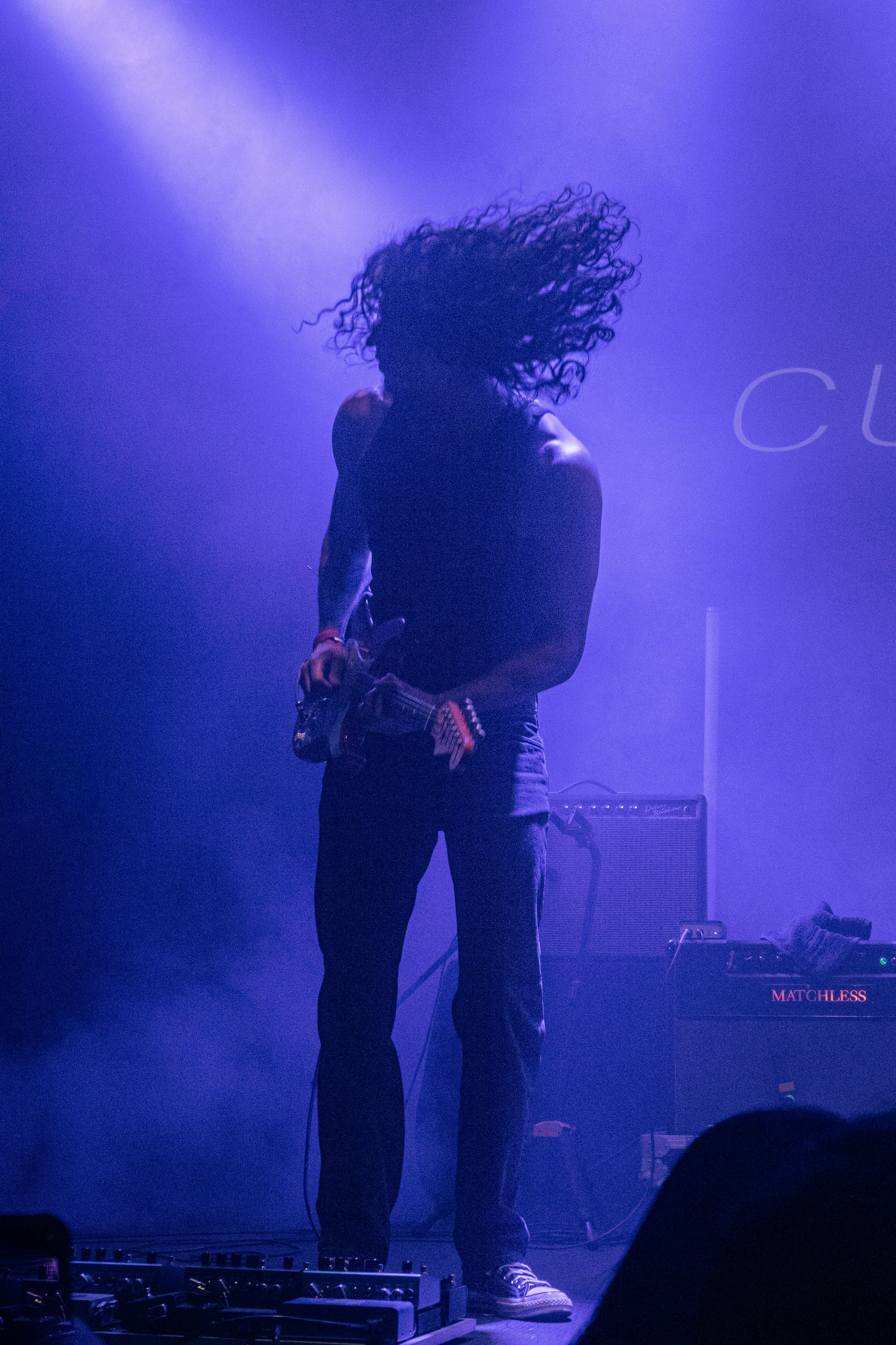 woman wearing yellow long-sleeved dress under white clouds and blue sky during daytime