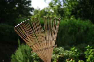 A large bamboo basket sitting on top of a wooden table