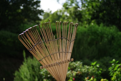 A large bamboo basket sitting on top of a wooden table