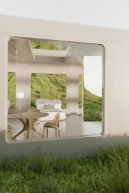 A room that has a table and chairs in it