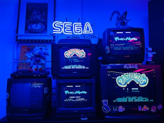 A group of old school video games sitting on top of a table