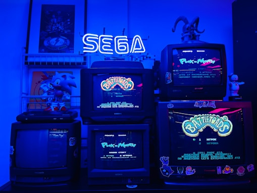 A group of old school video games sitting on top of a table