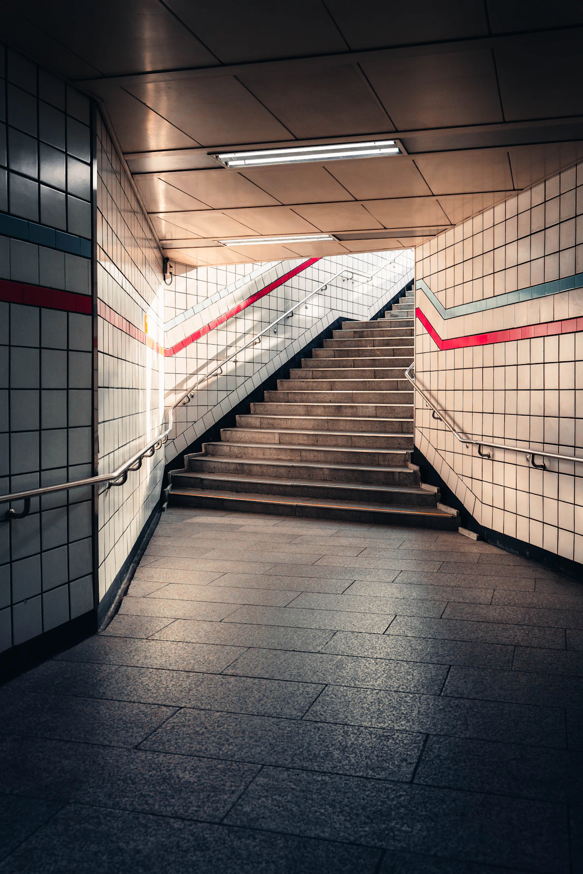 Tiled stairway leading up from a Seoul subway underpass