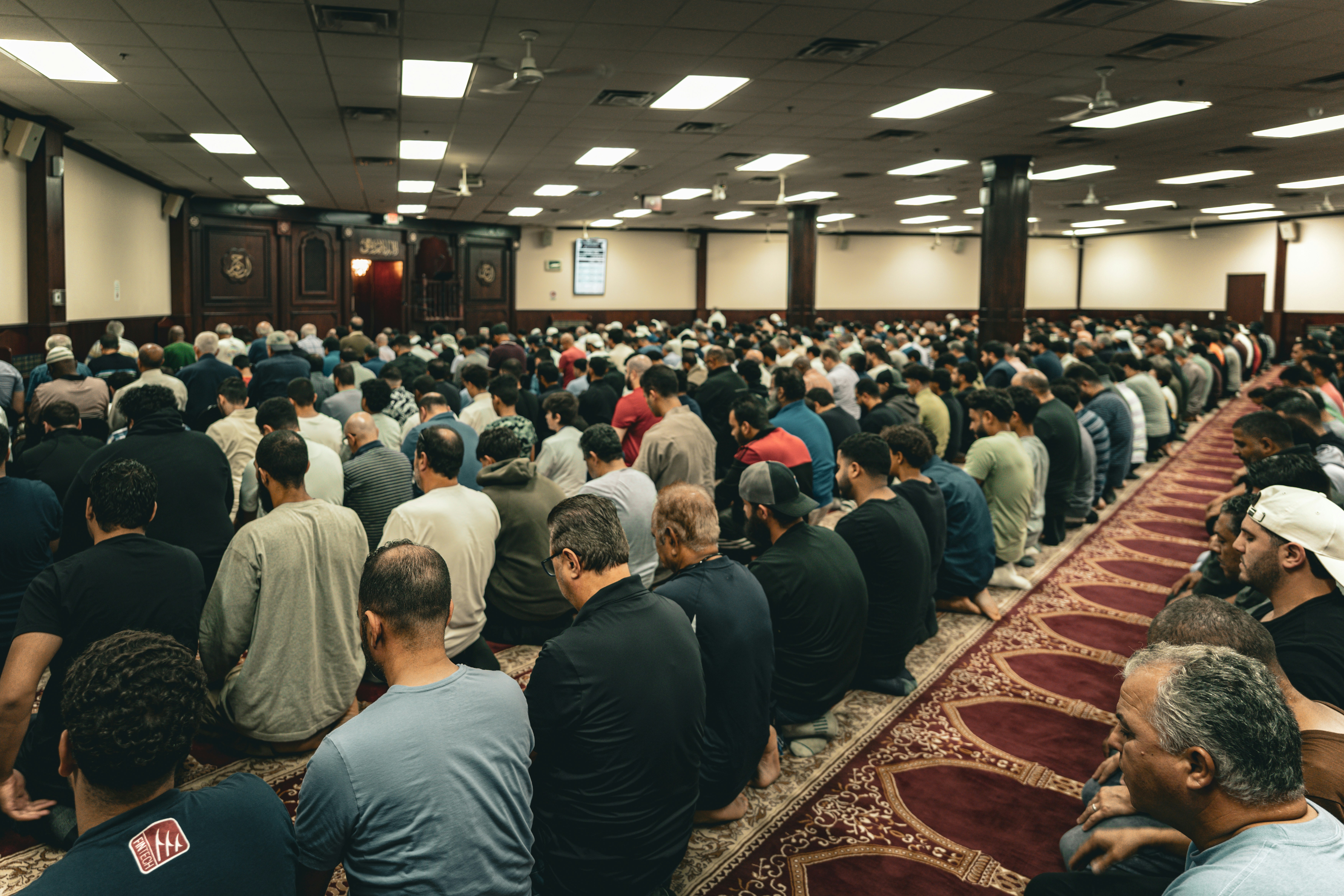 A large group of people sitting in a room