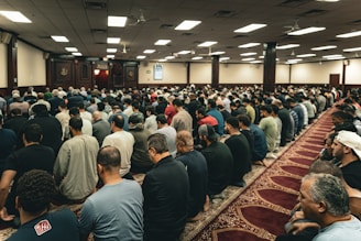 A large group of people sitting in a room