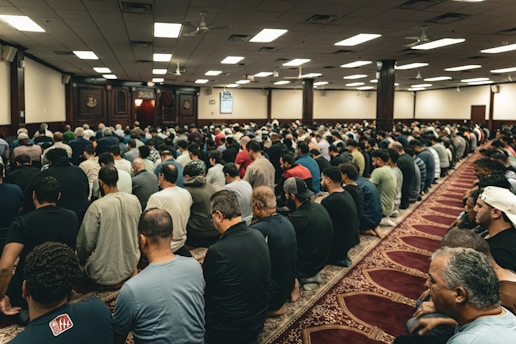 A large group of people sitting in a room