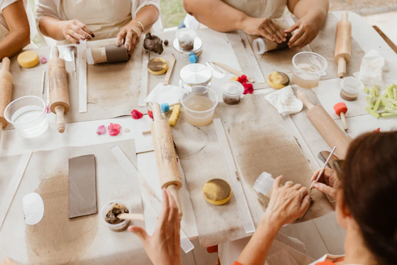 A group of people sitting around a table together