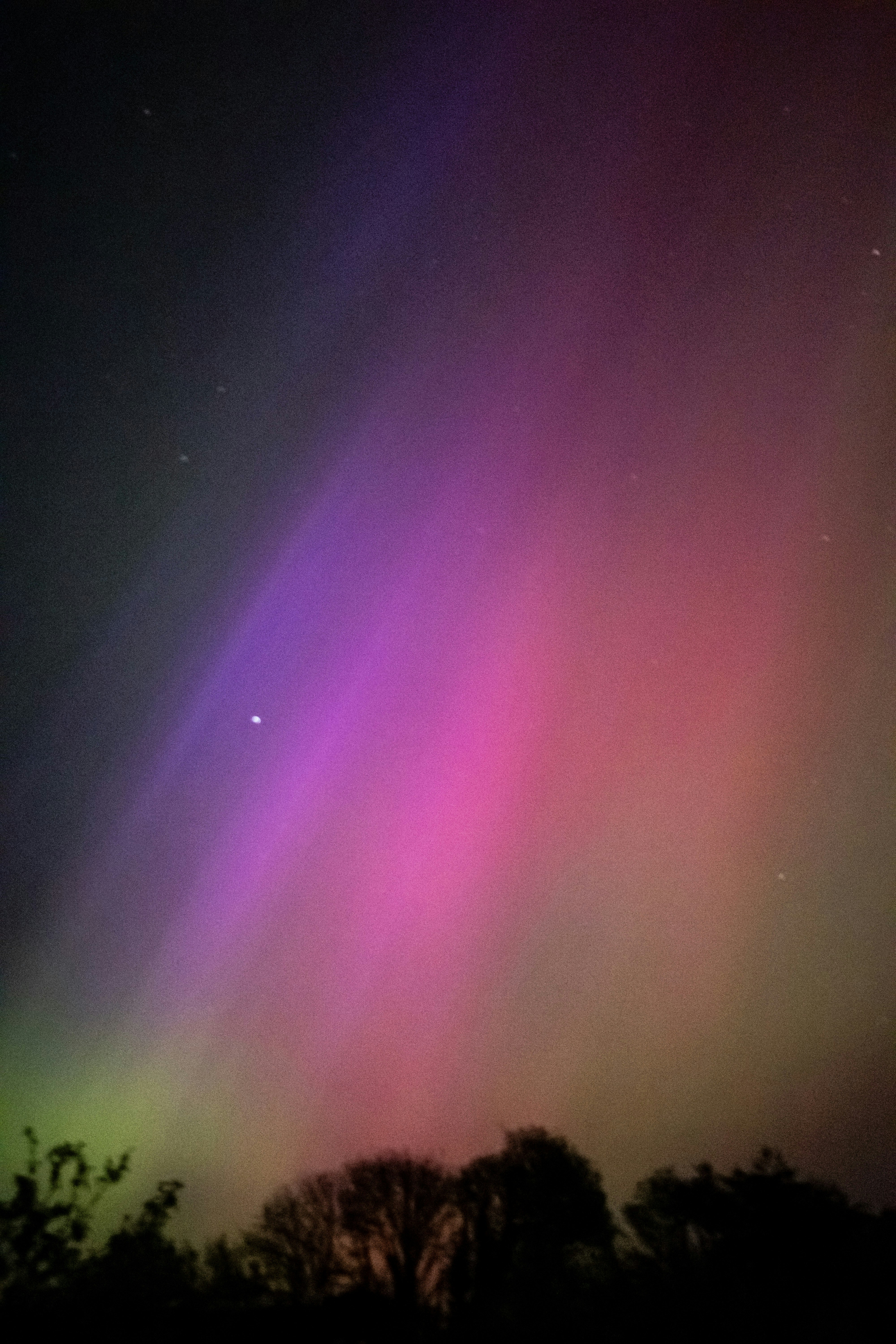 The aurora bore is visible in the night sky
