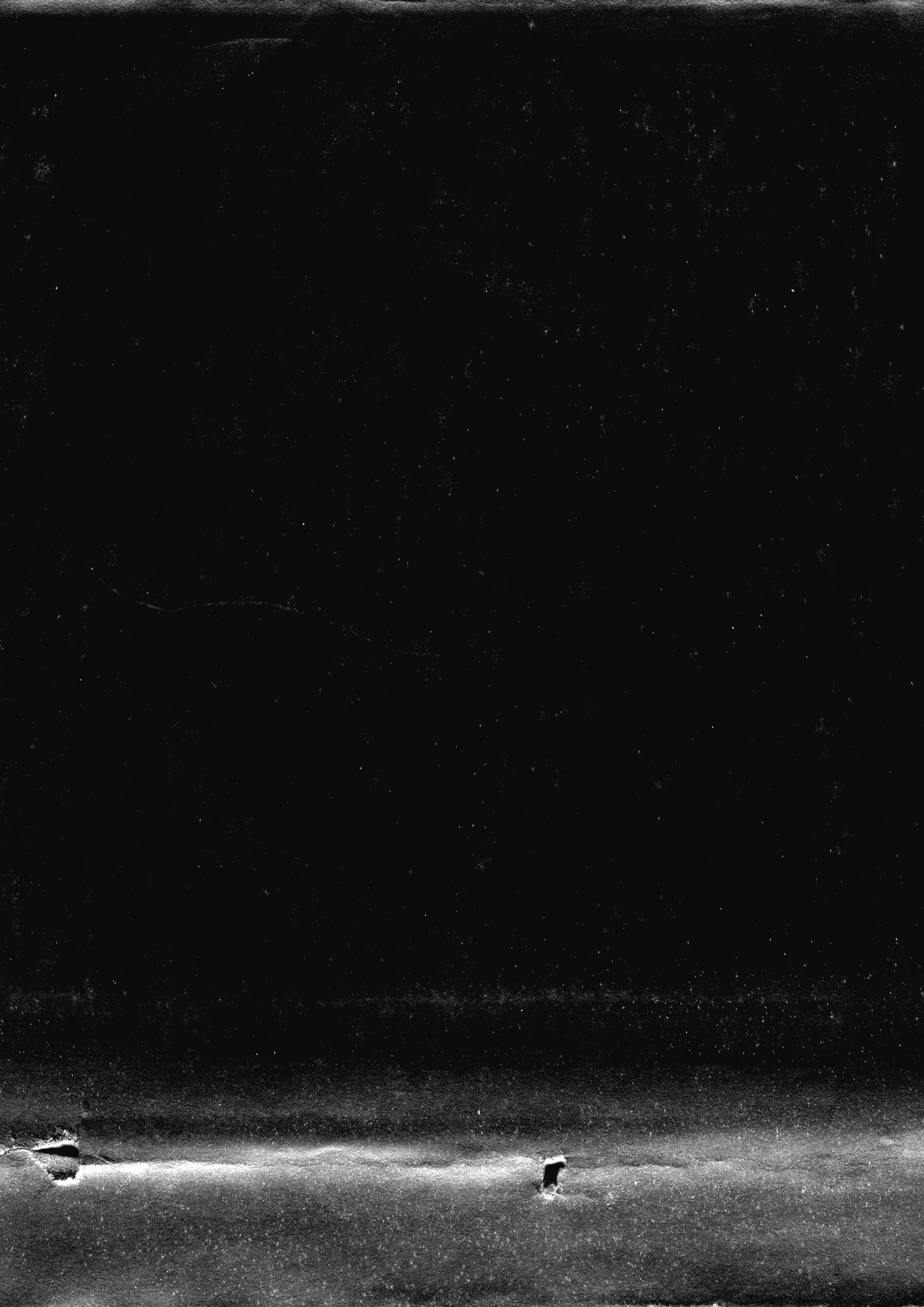 A black and white photo of a street sign