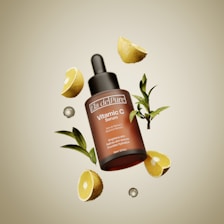A bottle of vitamin c on top of lemon slices