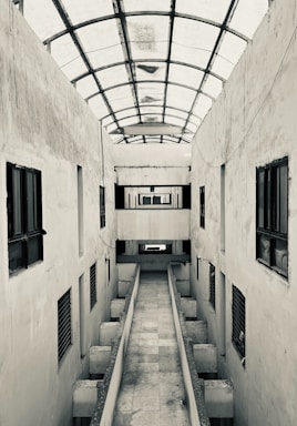 A long narrow hallway with a skylight above it