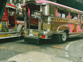 A couple of buses parked next to each other