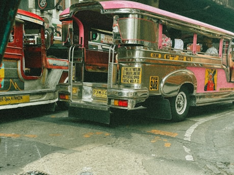 A couple of buses parked next to each other