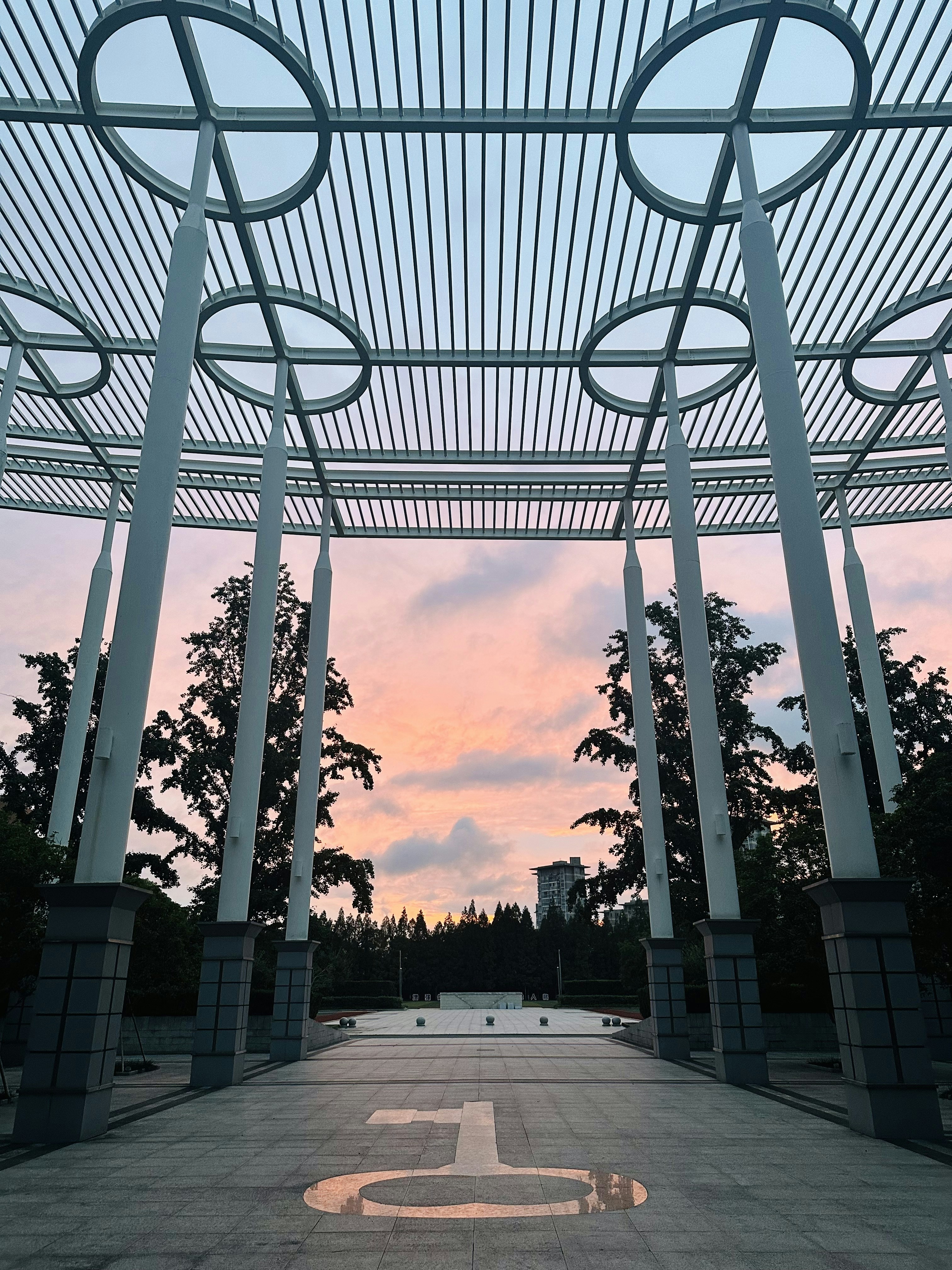 A view of a walkway with a sky in the background