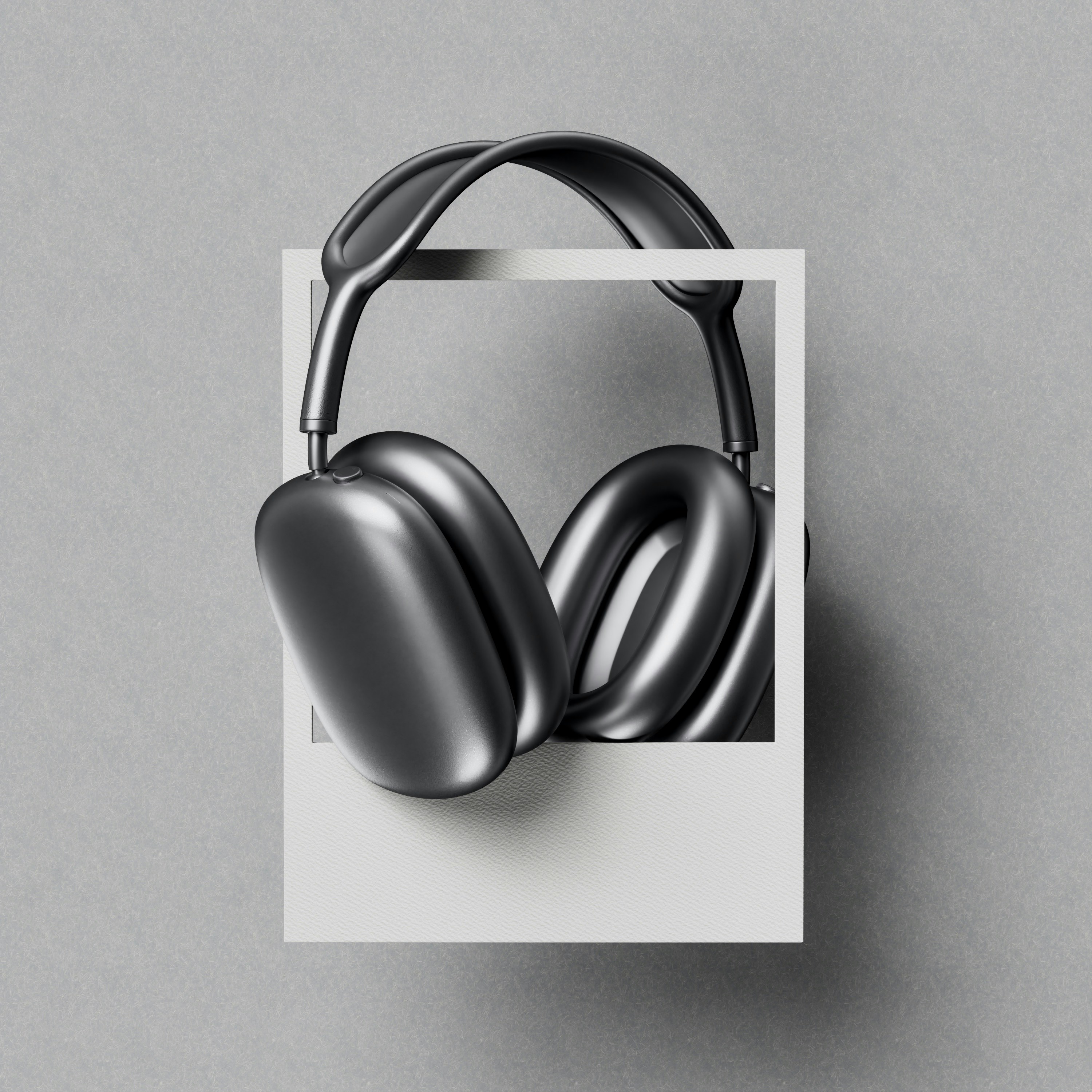 A pair of headphones hanging from a wall