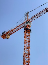 A large crane is standing in the sky