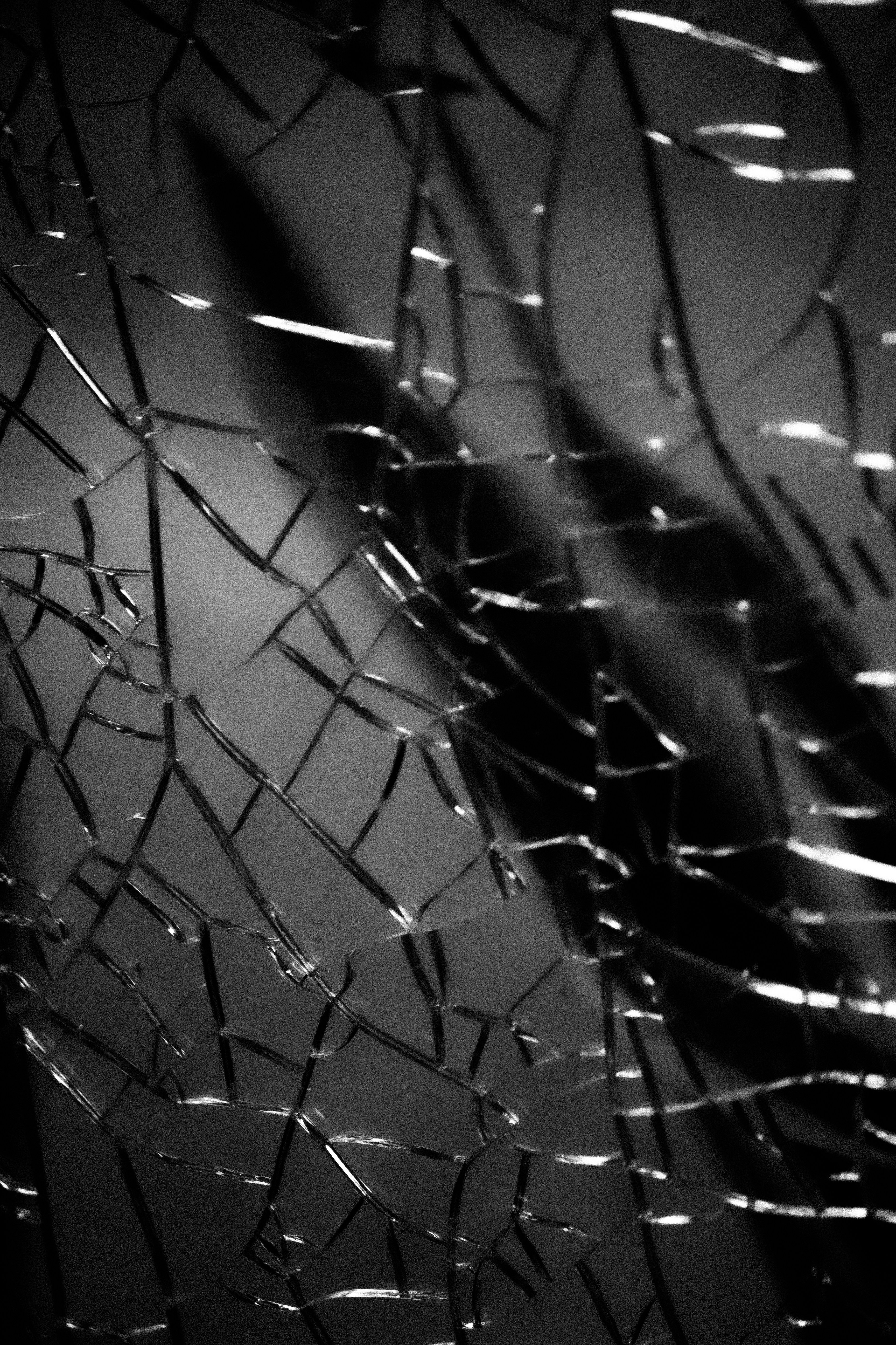 A black and white photo of a cracked glass photo – Free Cracked screen  Image on Unsplash, image size:3000x4500