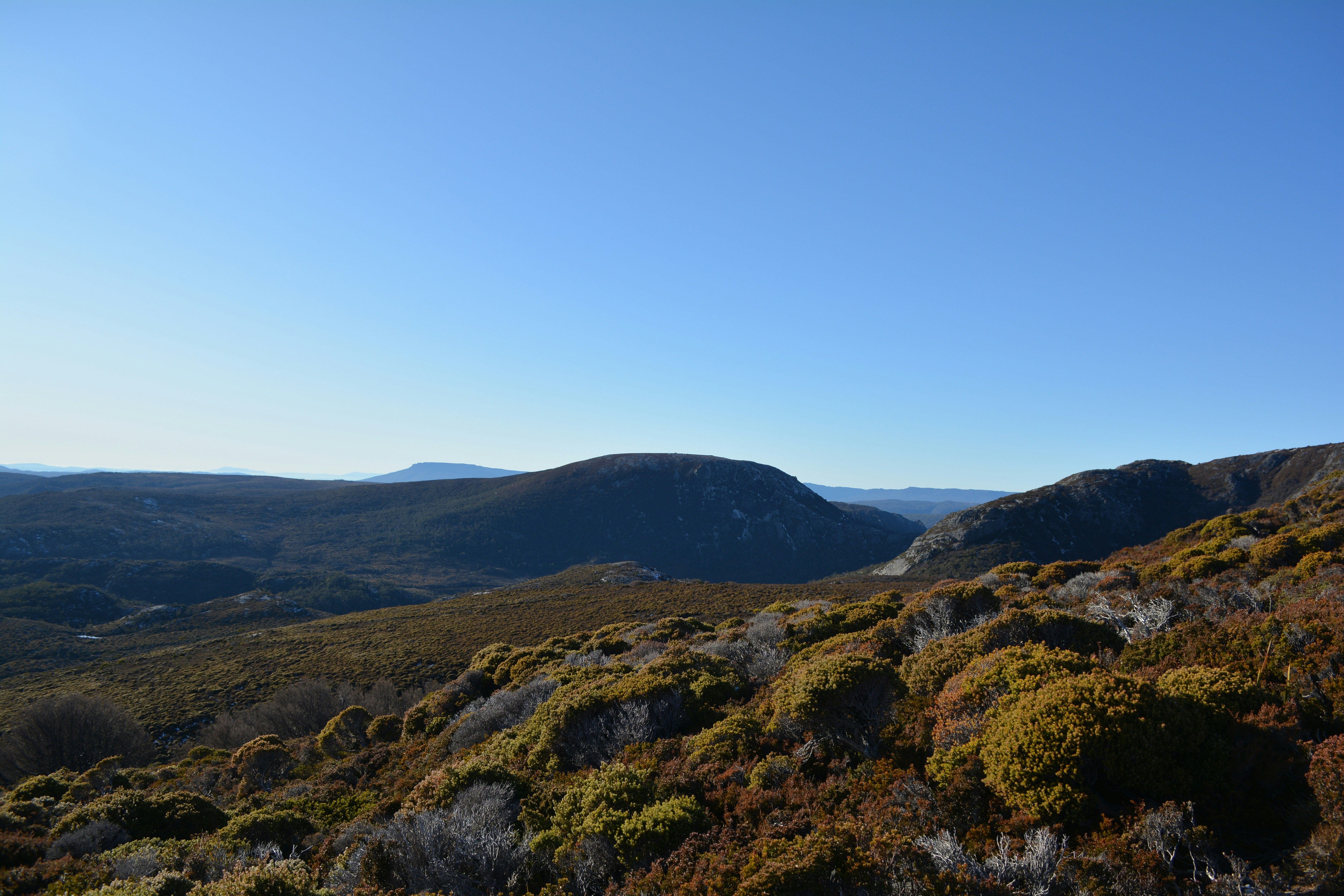 A view of a mountain range from a distance